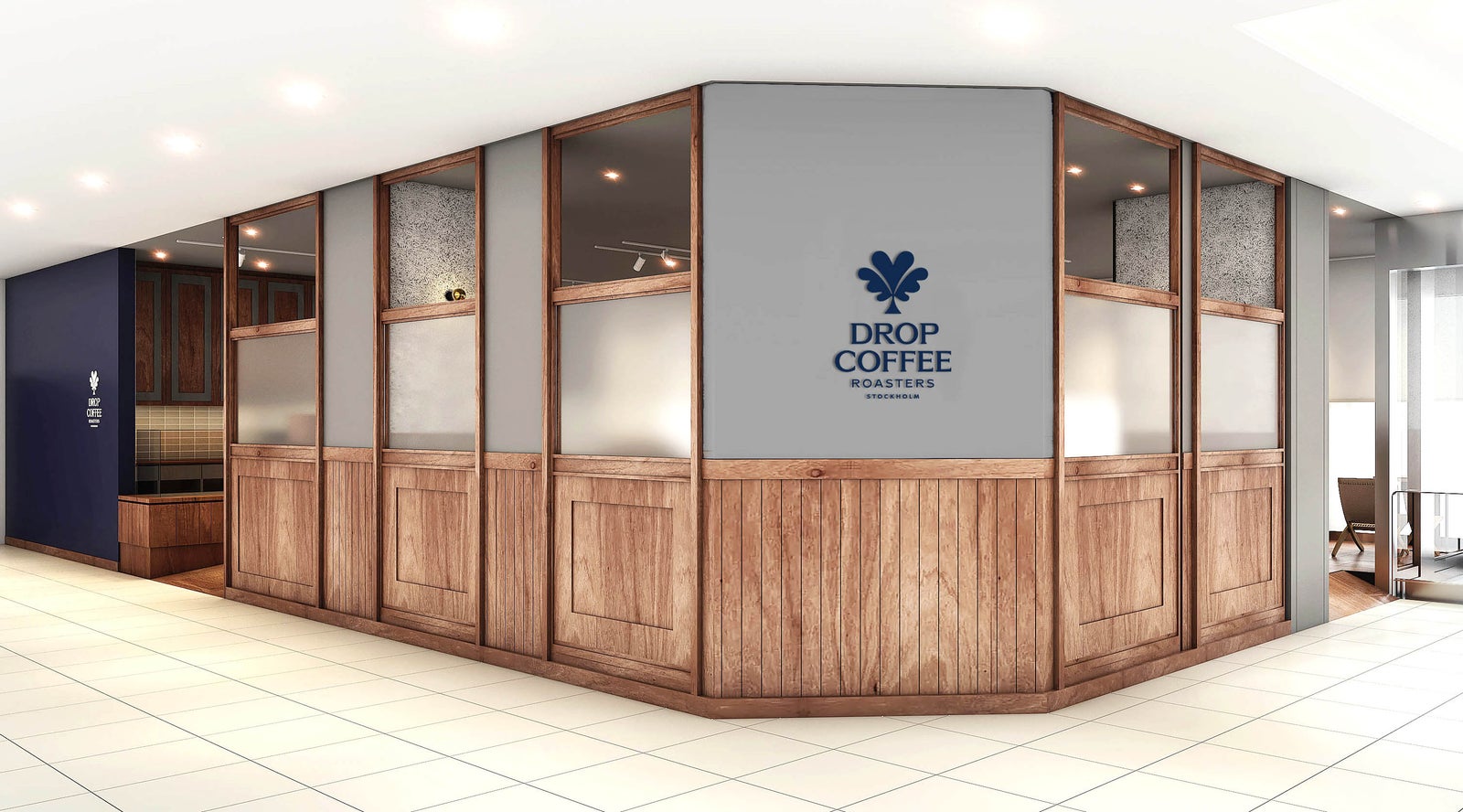 Drop Coffee Roasters 中野マルイ店の外観イメージ。木枠と板張りの壁に、濃紺のロゴ「DROP COFFEE ROASTERS STOCKHOLM」が掲げられている